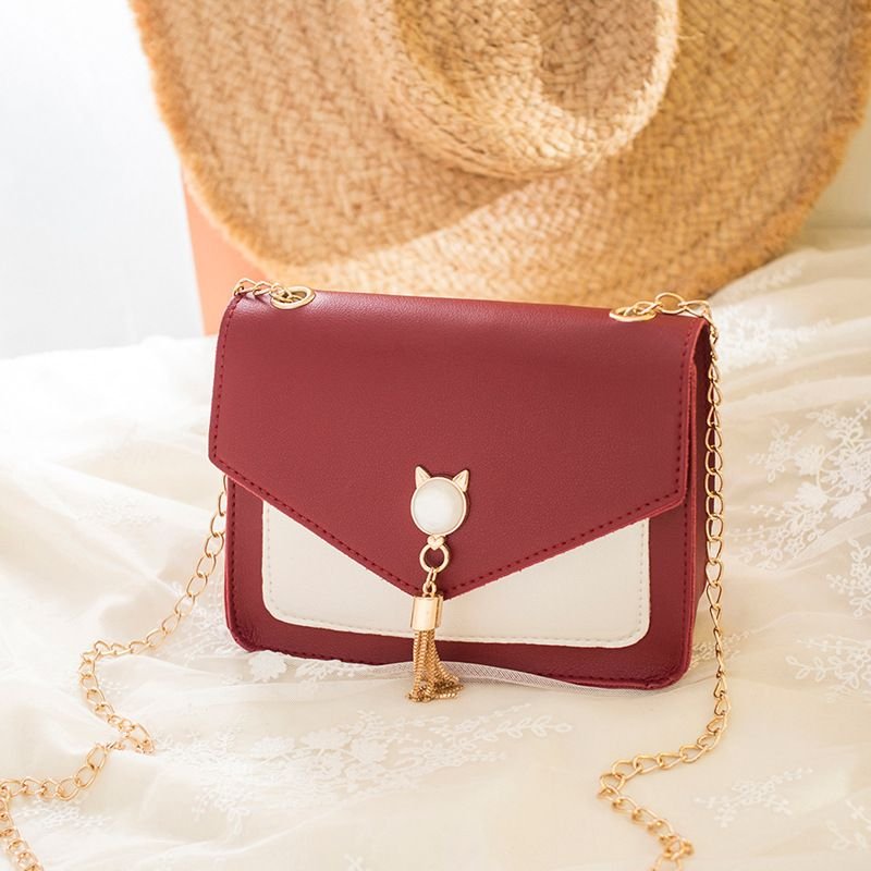 Women Chic Flap Buckle Design Cat Tassel Decoration Color Blocking PU Crossbody Bag